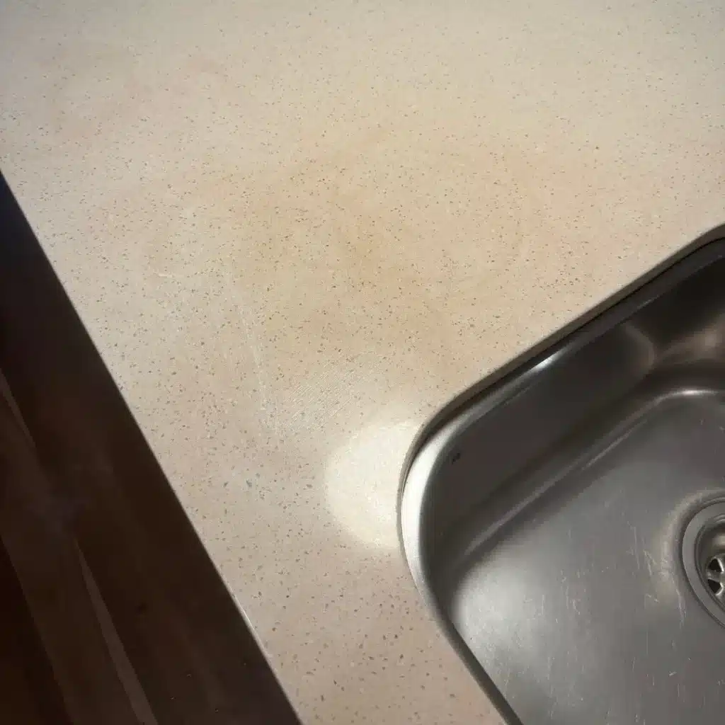 Dull finish around the sink renewed — before