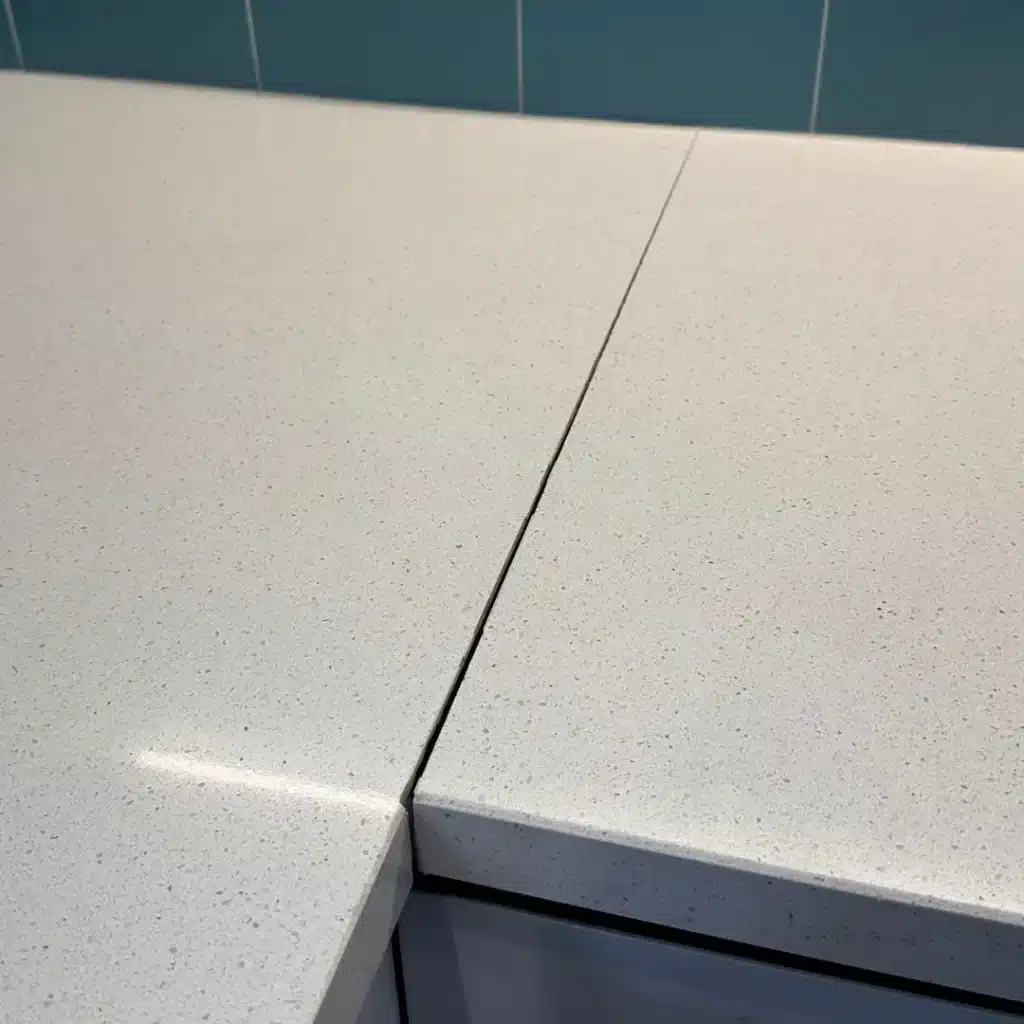 Open countertop seam repaired — before