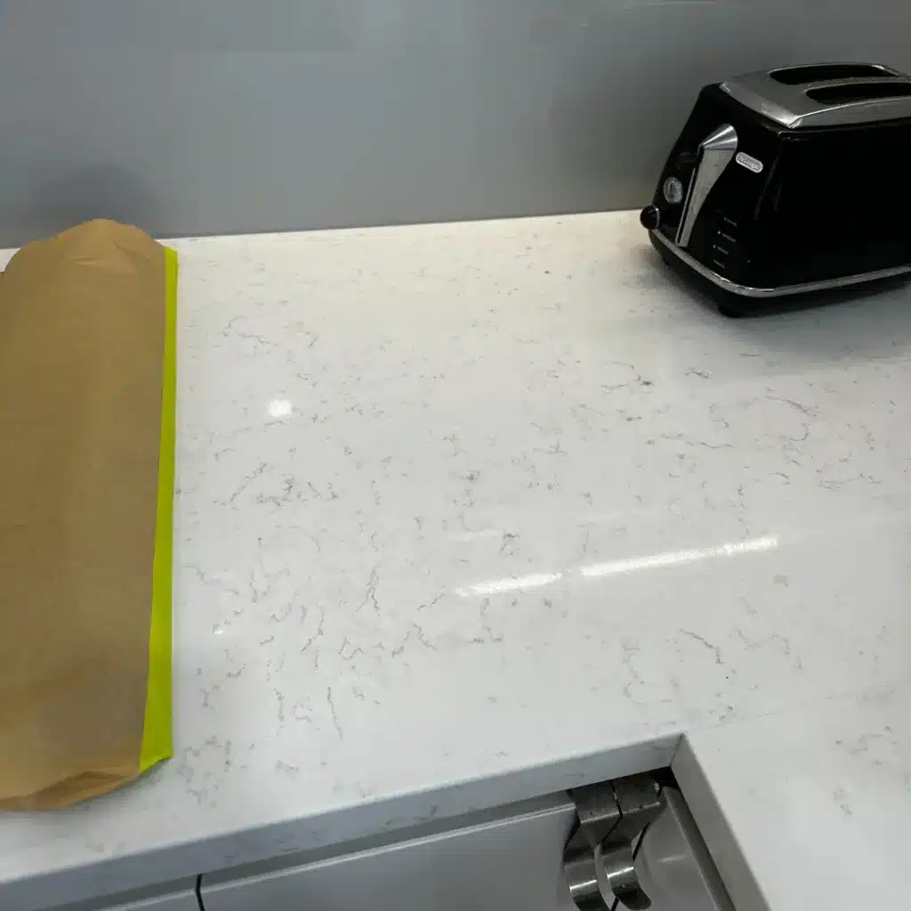 Heat mark on a light countertop repaired — after